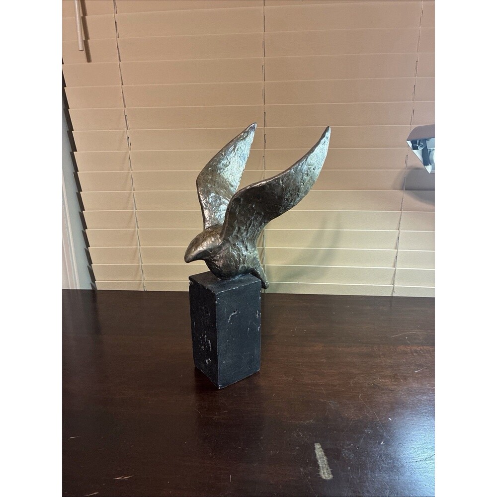 Silver Bird Figurine On Black Base